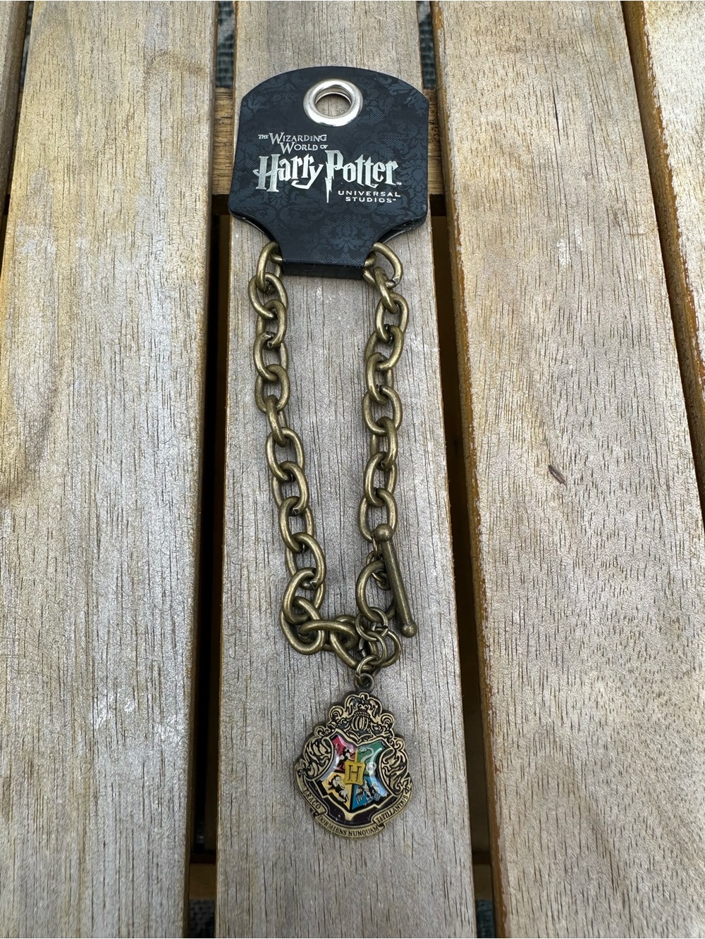 Harry Potter Gold-Tone Hogwarts Crest Pendant Bracelet